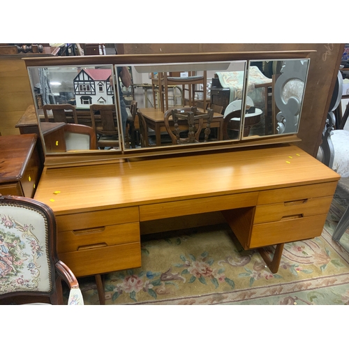 771 - A mid-century teak UniFlex dressing table W 153 cm