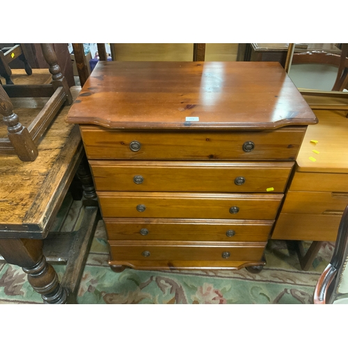 772 - A honey pine five drawer chest