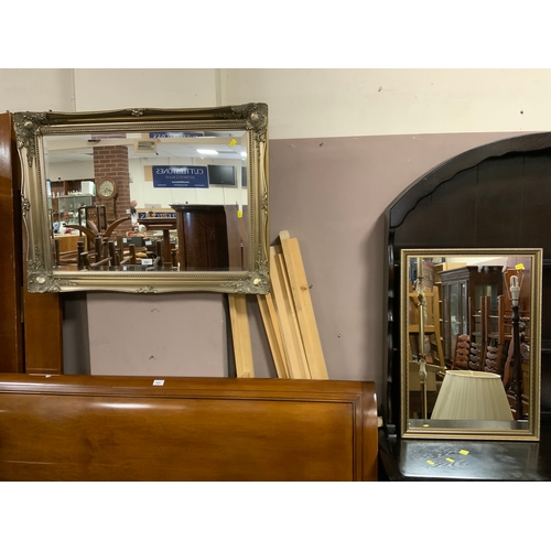 719 - A modern silver gilt rectangular mirror together with a smaller modern mirror