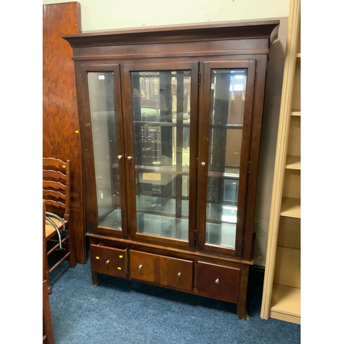 728 - A modern glazed display cabinet with three drawers below