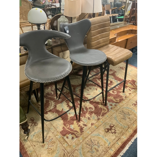 780 - Three modern assorted leather bar/kitchen stools