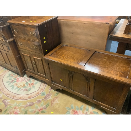 795 - A vintage oak blanket box together a small oak cabinet