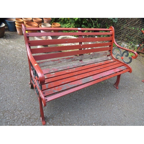 606 - A cast iron garden bench