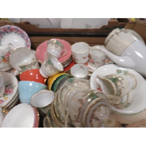 106 - Four trays of assorted ceramics to include Noritaki etc