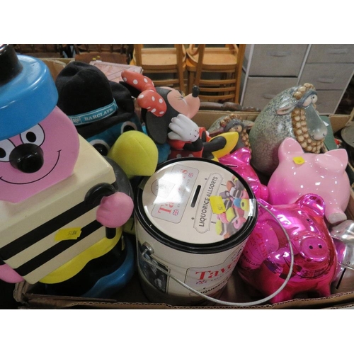 142 - A tray of assorted collectable money boxes and piggy banks