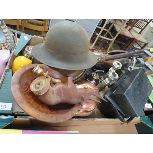 143 - A tray of assorted collectables to include a tin army hat, candlesticks etc