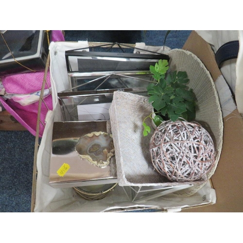 151 - Two boxes of decorative sundries to include homeware items