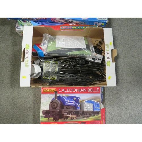 163 - A quantity of boxed Hornby and other train sets together with a box of track and accessories, toy st... 