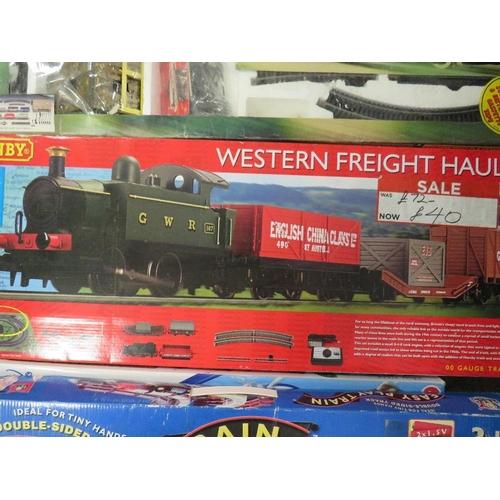 163 - A quantity of boxed Hornby and other train sets together with a box of track and accessories, toy st... 