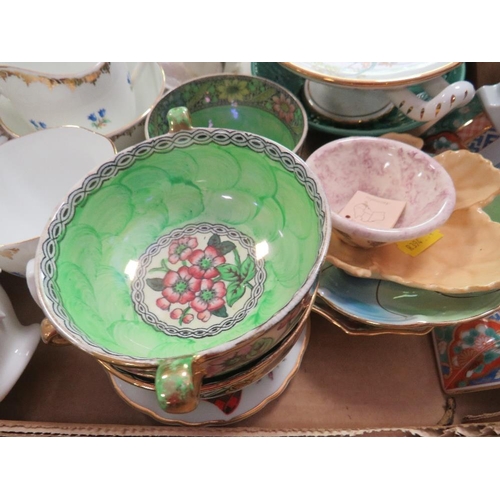 173 - Three trays of assorted ceramics and glass to include a Maling bowls, glass paper weight etc