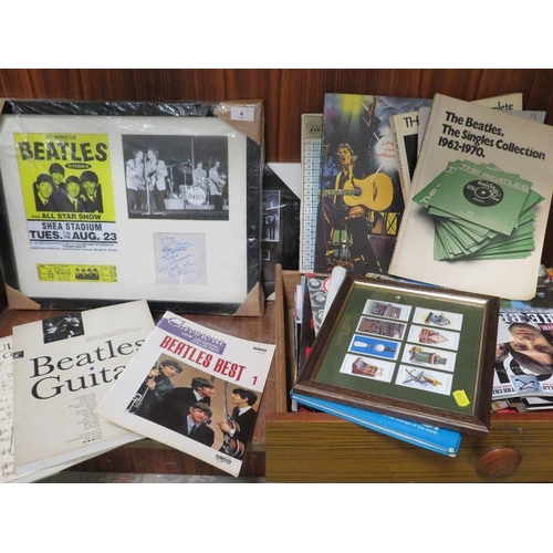 4 - A quantity of Beatles ephemera to include magazines, books and photographs with some reproduction au... 