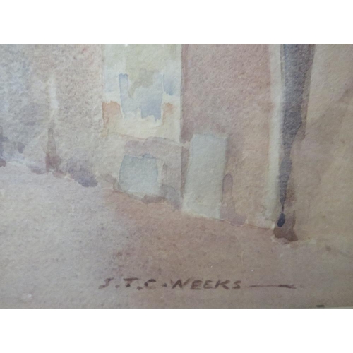 5 - A FRAMED AND GLAZED WATERCOLOUR OF AN INTERIOR SCENE BY S.T.C.WEEKS, SIGNED LOWER RIGHT