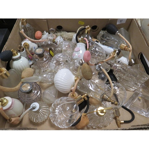 57 - A tray of assorted perfume bottles/sprays to include cut glass, china, etc.