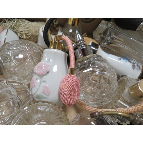 57 - A tray of assorted perfume bottles/sprays to include cut glass, china, etc.