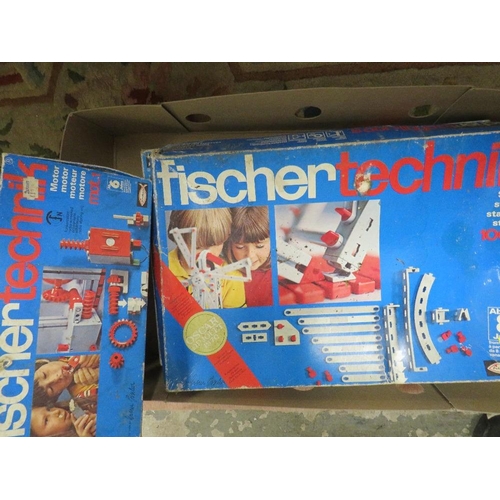 64 - Two boxes of Fischer Technik (unchecked)