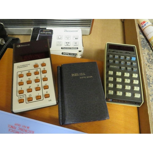 97 - A tray of collectables to include vintage calculator, a box of fishing flies, vintage radios etc.