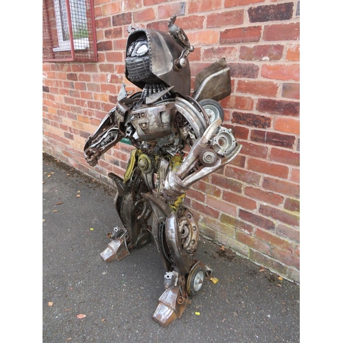 602 - A large 'scratch built 'Scrap Metal' transformer / robot model, made from car parts, motorcycle and ... 