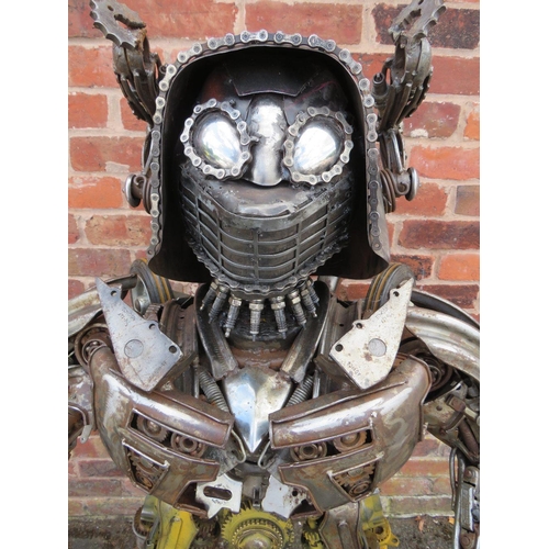 602 - A large 'scratch built 'Scrap Metal' transformer / robot model, made from car parts, motorcycle and ... 