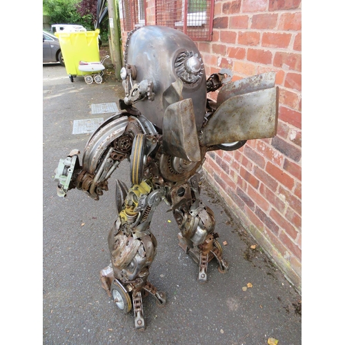 602 - A large 'scratch built 'Scrap Metal' transformer / robot model, made from car parts, motorcycle and ... 