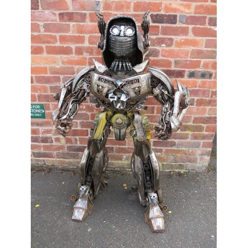 602 - A large 'scratch built 'Scrap Metal' transformer / robot model, made from car parts, motorcycle and ... 