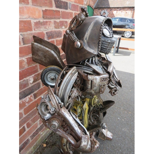 602 - A large 'scratch built 'Scrap Metal' transformer / robot model, made from car parts, motorcycle and ... 