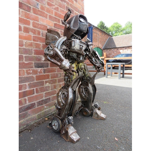 602 - A large 'scratch built 'Scrap Metal' transformer / robot model, made from car parts, motorcycle and ... 