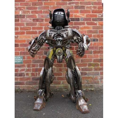 602 - A large 'scratch built 'Scrap Metal' transformer / robot model, made from car parts, motorcycle and ... 