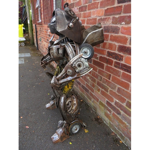 602 - A large 'scratch built 'Scrap Metal' transformer / robot model, made from car parts, motorcycle and ... 