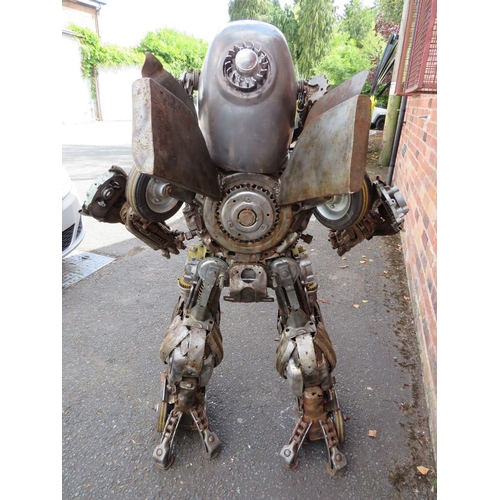 602 - A large 'scratch built 'Scrap Metal' transformer / robot model, made from car parts, motorcycle and ... 