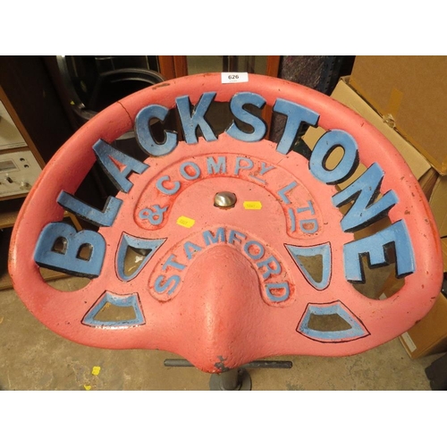 626 - A cast iron tractor seat