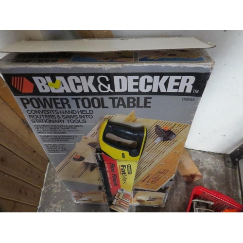 652 - A boxed Black and Decker power tool table together with a tray of tools