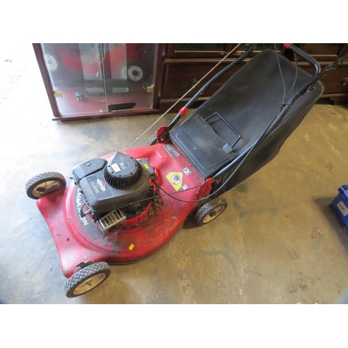 653 - A Champion petrol lawn mower