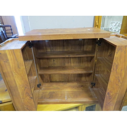 798 - Three modern items of furniture to include a solid pine dressing table, a two door drinks cabinet an... 