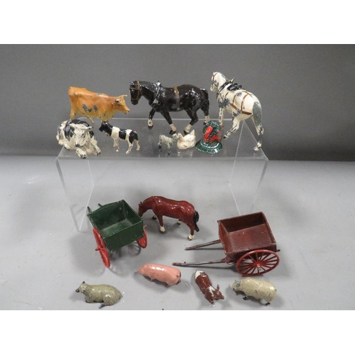 490 - A collection of lead farm animals, including Britains