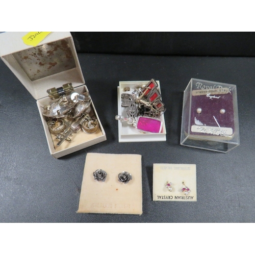 455 - A box of silver and white metal jewellery to include earrings