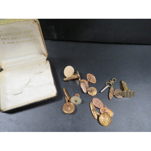 456 - A selection of cufflinks to include a hallmarked 9 carat gold pair