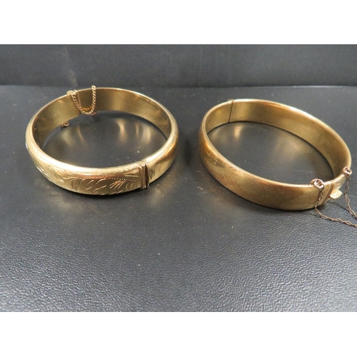 461 - Two vintage gold plated bangles