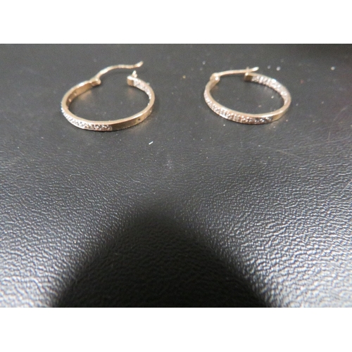 477 - A pair of 9 carat gold hoop earring approx. weight 2.4g