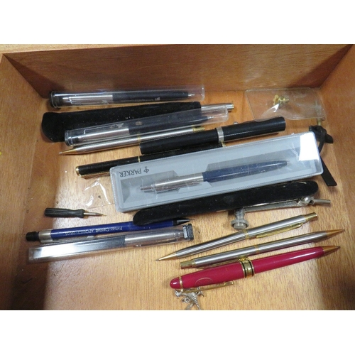 486 - A tray of collectables pens and pencils to include Parker