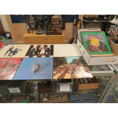 122 - A collection of 18 LP records and one box set to include Beatles white album, Beatles Abby Road, Blo... 