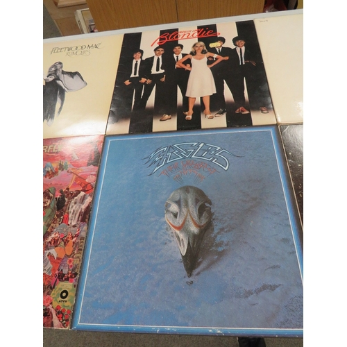 122 - A collection of 18 LP records and one box set to include Beatles white album, Beatles Abby Road, Blo... 