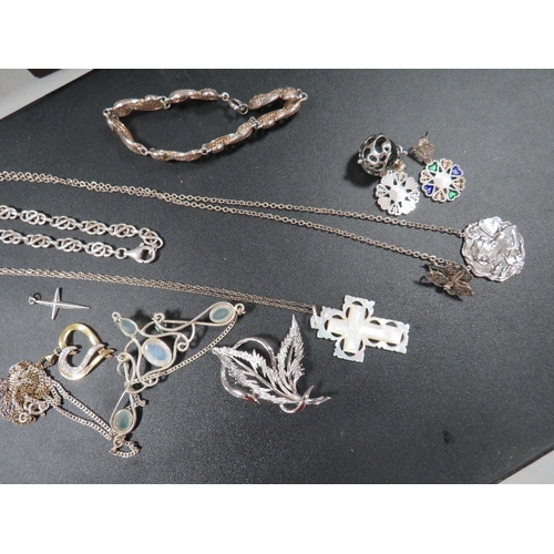 491 - A selection of silver and white metal jewellery in include vermeil Heng Ngai necklace etc.