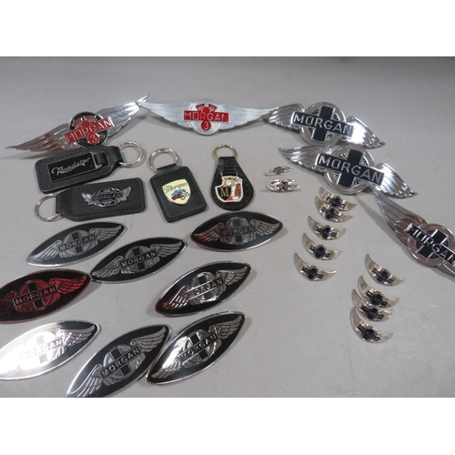 492 - A collection of assorted Morgan car related badges, pins, keyrings and walking stick emblems etc