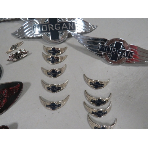 492 - A collection of assorted Morgan car related badges, pins, keyrings and walking stick emblems etc