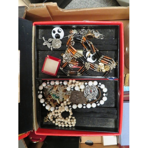 497 - A large tray of costume jewellery to include jewellery boxes etc