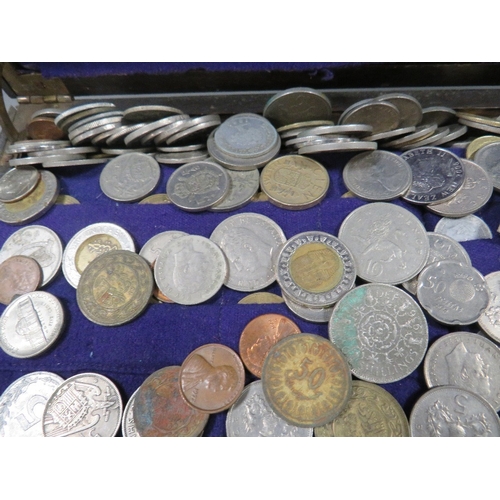 505 - A cutlery box with a tin of collectable coins and notes