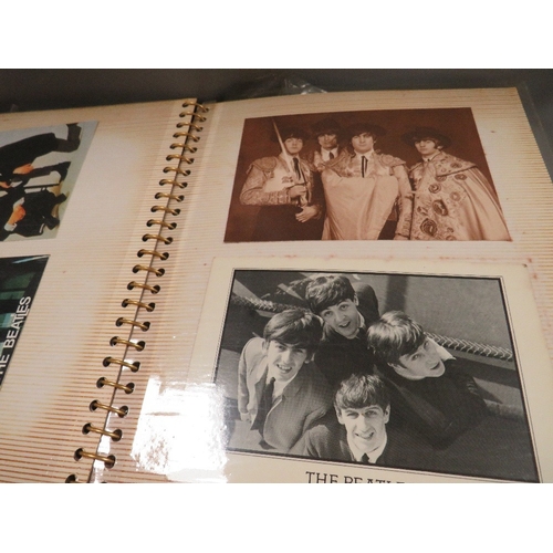 515 - Three folders of Beatles memorabilia to include postcards, magazines etc