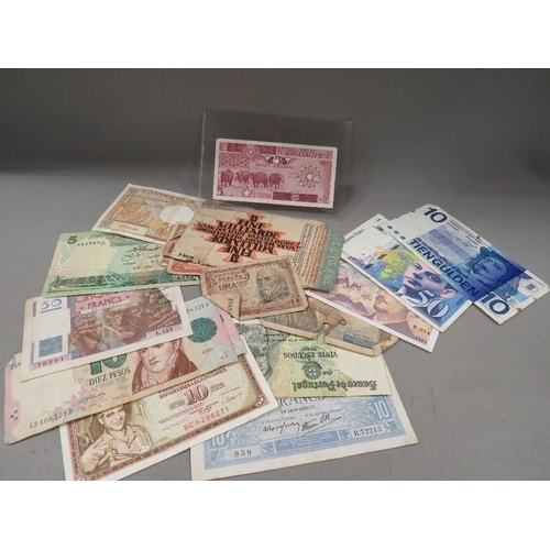 529 - A collection of vintage world banknotes