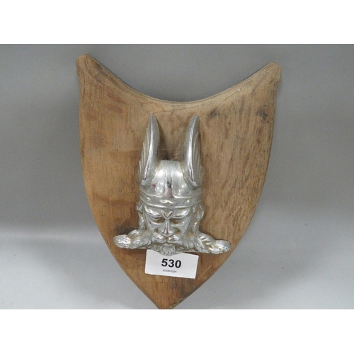 530 - A vintage Rover Viking car badge mounted on wooden shield