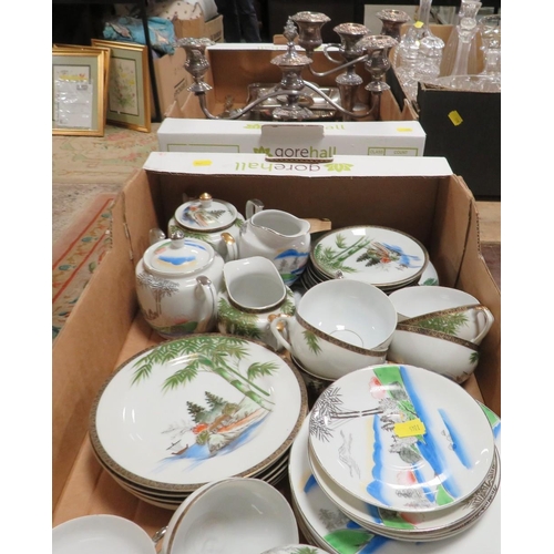 61 - A tray of  metal ware to include candelabra  together with a tray of oriental style tea ware